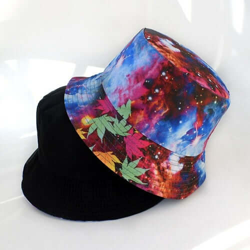 Vibe Vision reversible bucket hat featuring vibrant tie-dye and black designs, ideal for festivals and stylish outings.