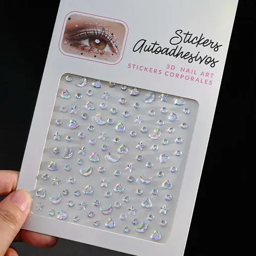 Stargirl Sparkle Gems in various shapes for festival glam, featuring holographic rhinestones and easy-peel application.