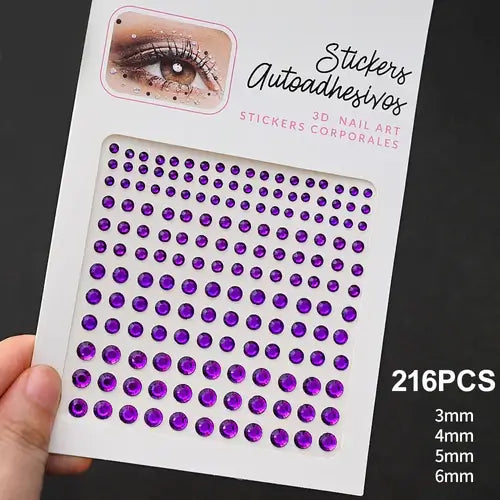Sheet of purple self-adhesive rhinestones for nail art, includes 216 pieces in various sizes.
