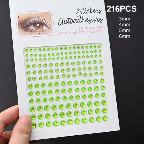 Stickers with green rhinestones in various sizes for 3D nail art, showcasing an eye design.