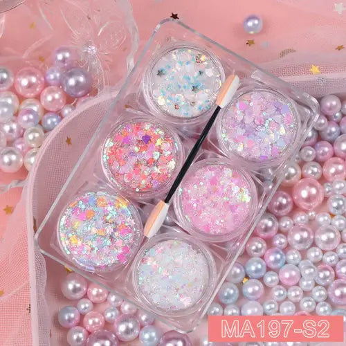 Rave Glow 6-Piece Glitter Gel Set in jars surrounded by pastel pearls, perfect for festival makeup and body art.