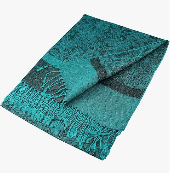 Elegant turquoise pashmina shawl with intricate patterns and hand-knotted tassels, perfect for stylish warmth.