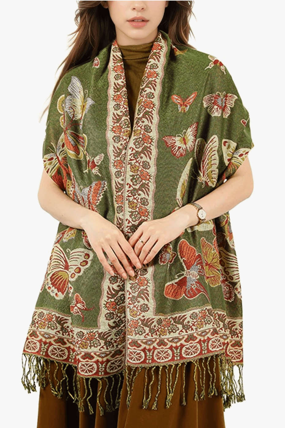 Model wearing a green pashmina shawl featuring colorful butterfly patterns and intricate detailing.