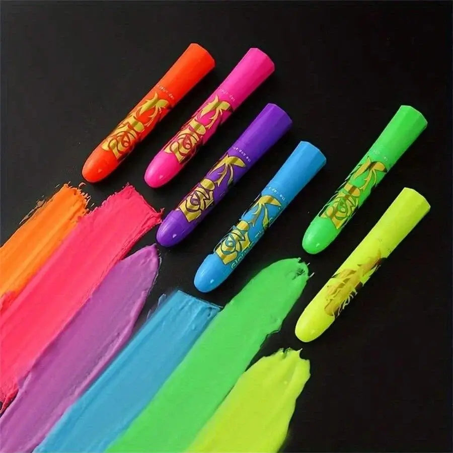 Neon Vibe UV Glow Crayon Set with six vibrant colors on a black background, perfect for festival body art designs.