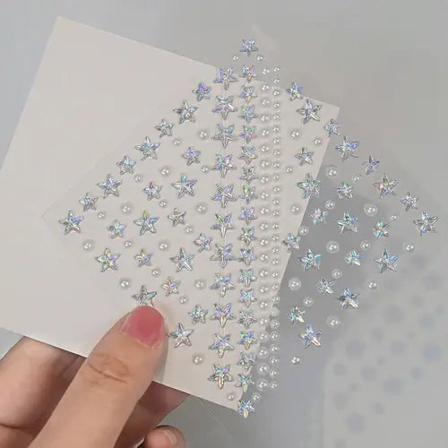 Stargirl Sparkle Gems with iridescent stars and pearls for festival glam and easy application.