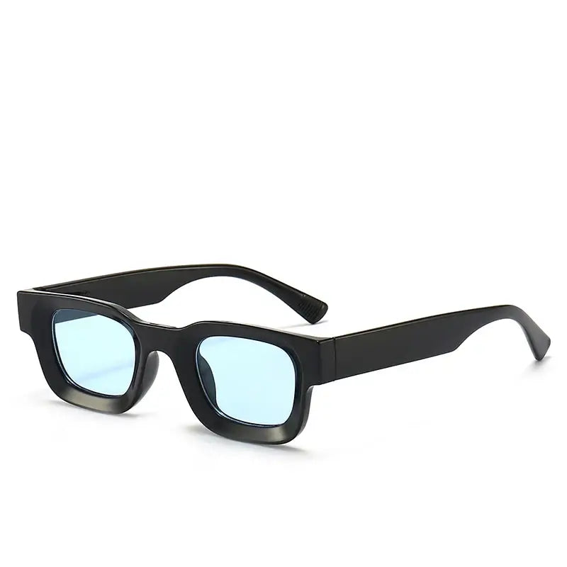 Bold block sunglasses with a retro rectangular frame and blue lenses, perfect for fashion-forward looks.