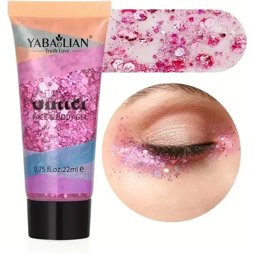 Yabalain glitter face and body gel tube with swatch and eye close-up showcasing shimmering pink glitter.