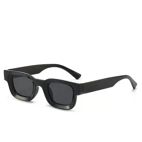 Bold block sunglasses with retro rectangular frames in black, perfect for festivals and everyday style.