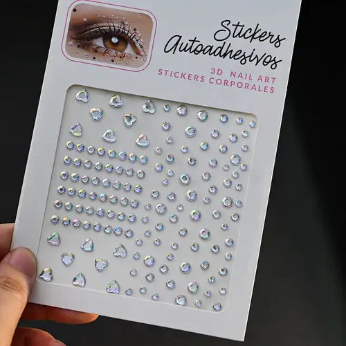 Sheet of iridescent gem stickers in various shapes for nail art and body decoration.