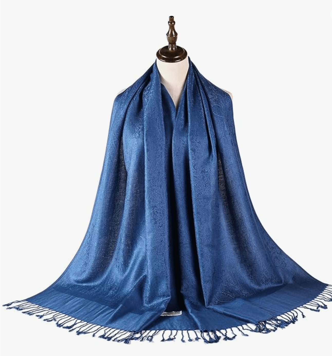 Elegant blue pashmina scarf displayed on a mannequin, showcasing luxurious texture and fringe details.