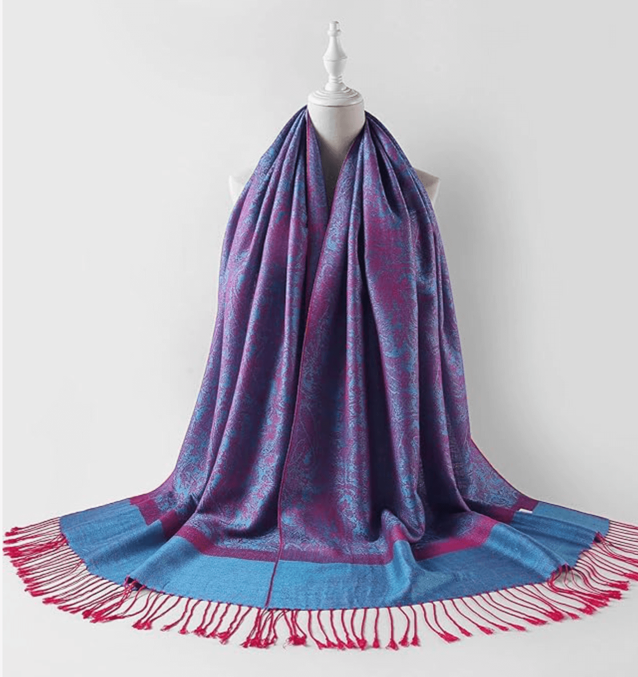Celestial Horizons Pashmina Collection in vibrant purple and blue with fringed edges, perfect for stylish layering.