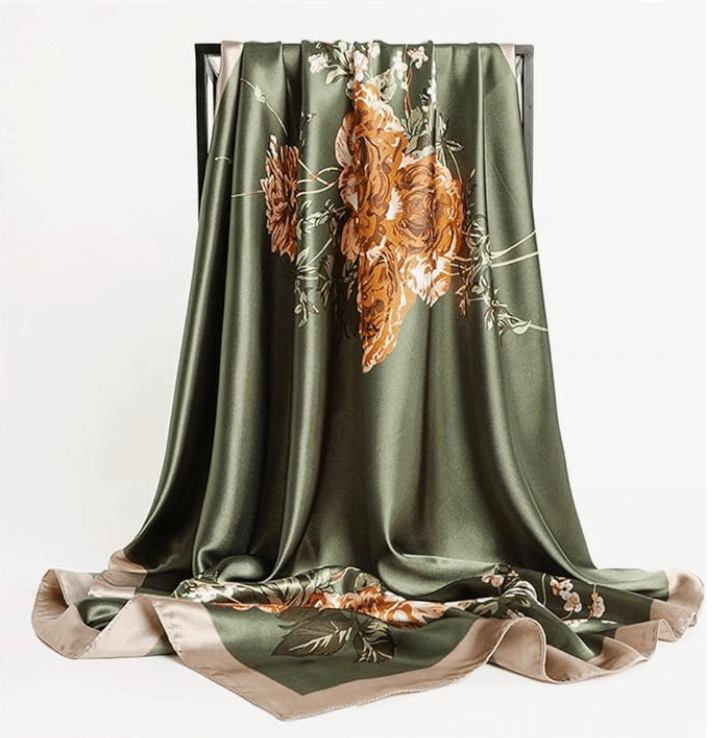 Eclipse Luxe Satin Scarf featuring floral design in olive green and gold, soft and stylish fabric.