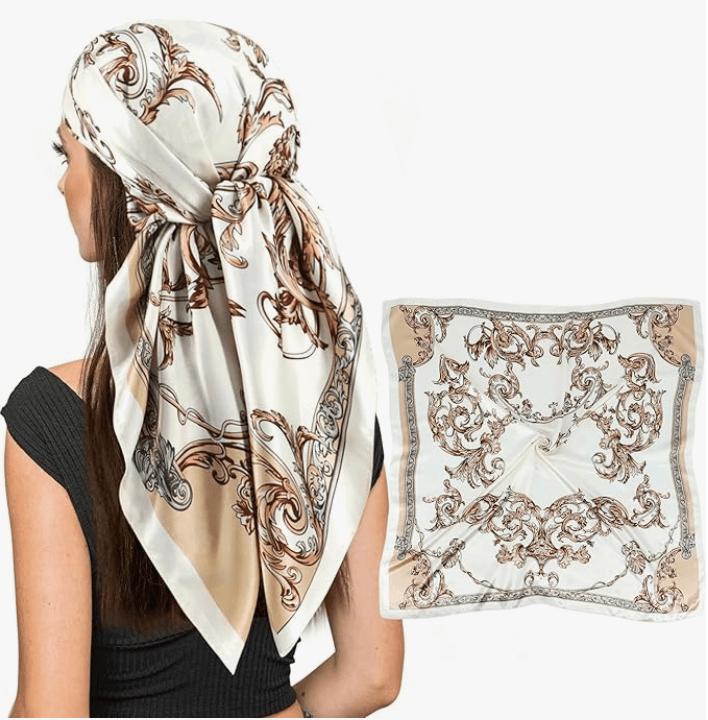 Eclipse Luxe Satin Scarf styled on a woman, showcasing a soft, silky design with intricate patterns.