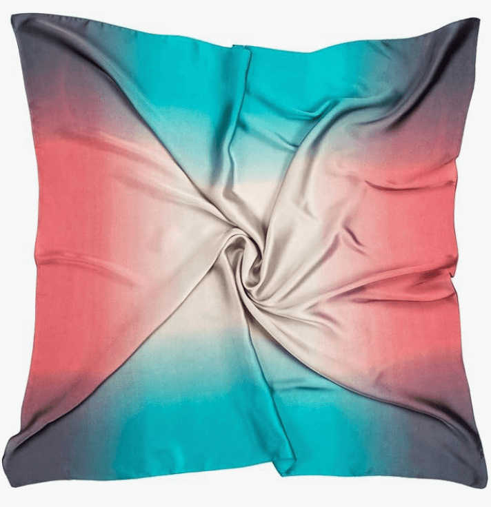 Luna Satin Headscarf in vibrant coral and teal colors, perfect for stylish headwraps and beach accessories.