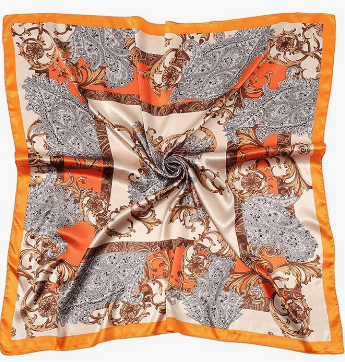 Luna Satin Headscarf in orange and grey paisley pattern, silky-soft finish for versatile styling.