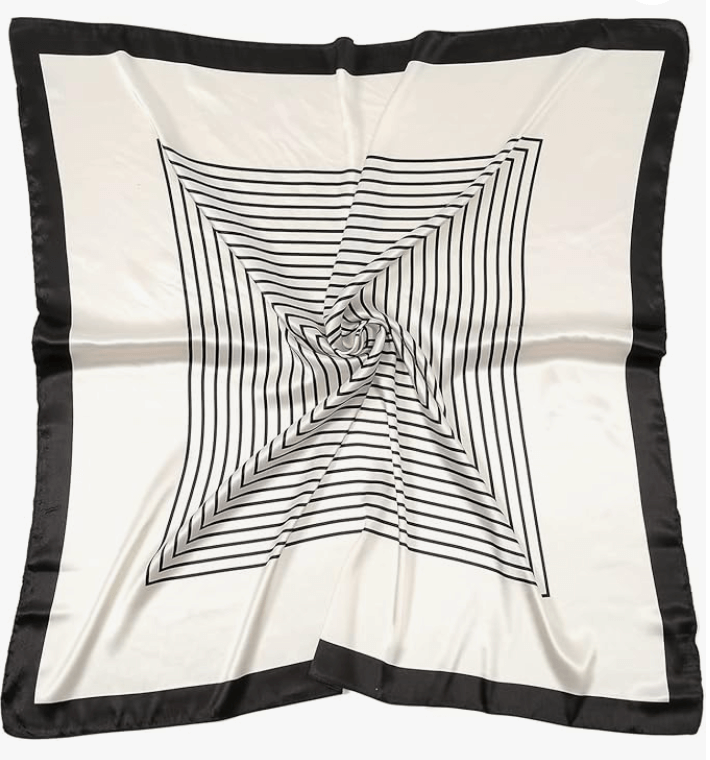 Luna Satin Headscarf featuring a stylish black and white spiral striped design with glossy satin finish.