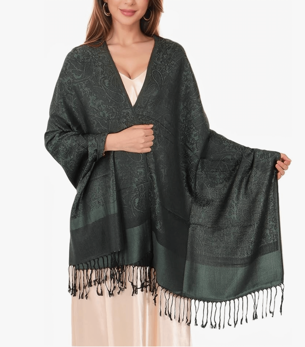 Model showcasing a luxury dark green festival pashmina with intricate patterns and fringes.