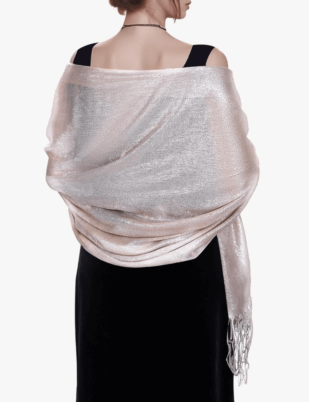 Woman wearing a sparkly pashmina shawl, showcasing its shimmer and elegance from a back view.