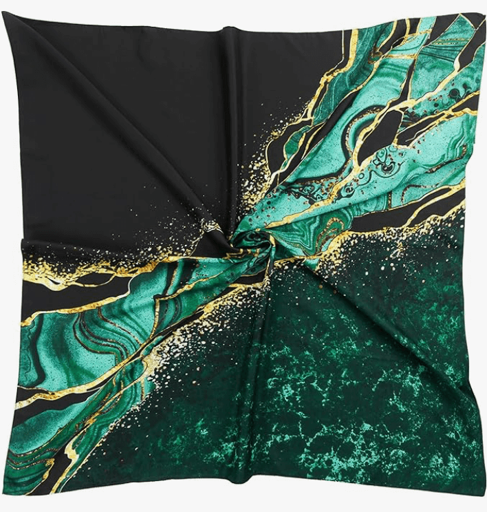 Starluxe Satin Headscarf featuring a bold black and teal design with golden accents, perfect for stylish accessories.