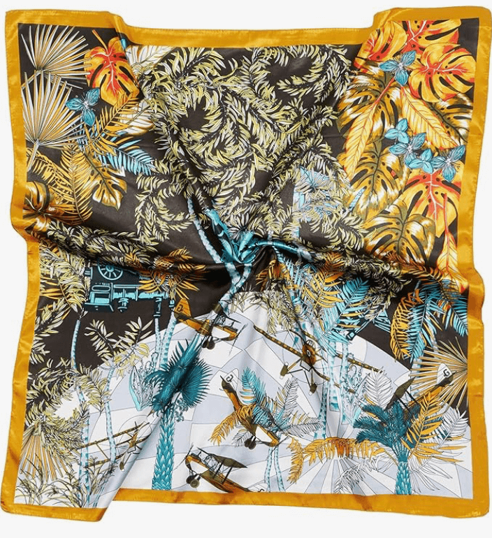 Starluxe Satin Headscarf featuring vibrant tropical print with parrots and lush foliage pattern.