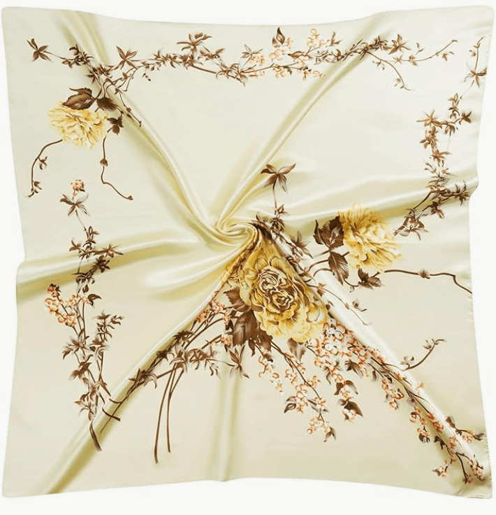 Starluxe Satin Headscarf featuring floral design in soft hues of cream and gold, perfect for stylish accessory looks.