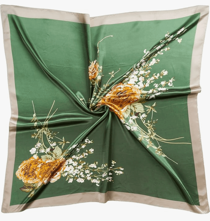 Starluxe satin headscarf featuring a floral design on a green background with a satin finish.