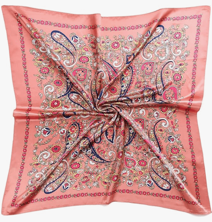 Starluxe Satin Headscarf featuring a vibrant paisley pattern on smooth satin fabric, perfect for glamorous styling.