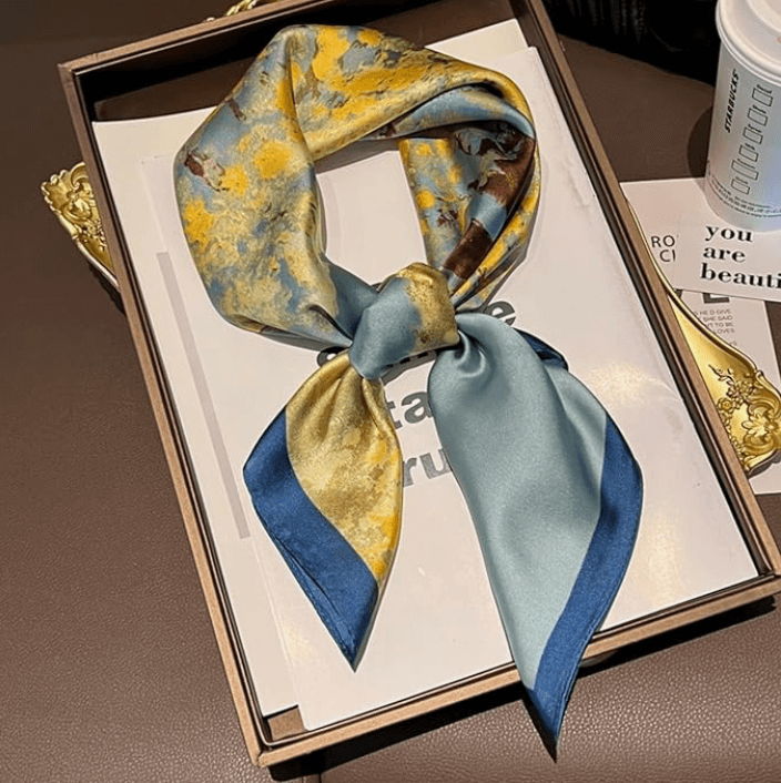Vintage Luxe Satin Scarf in a gift box, showcasing a colorful design perfect for festivals and versatile styling.