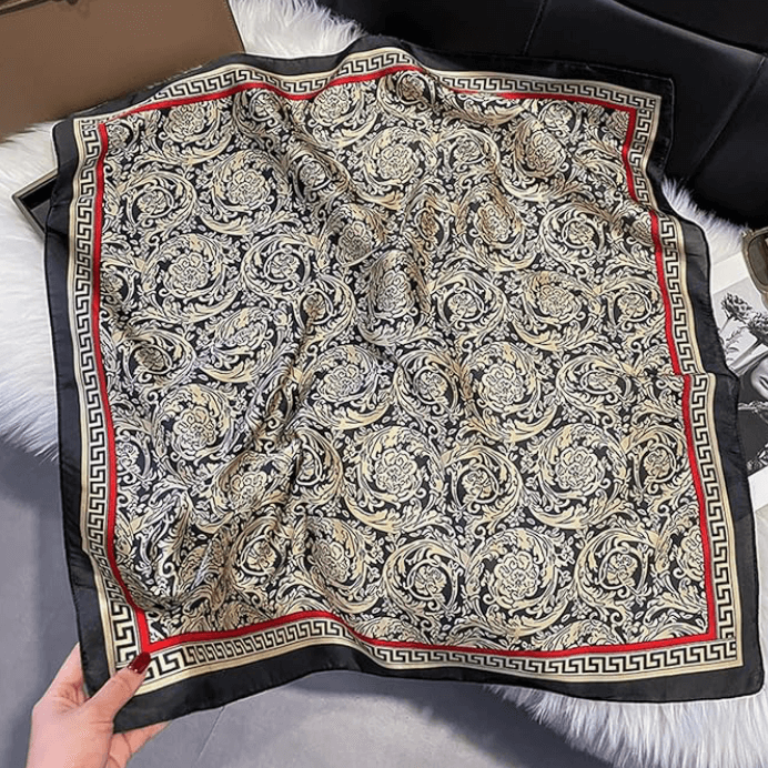 Vintage Luxe Satin Scarf featuring intricate floral patterns and a bold border, perfect for versatile styling.